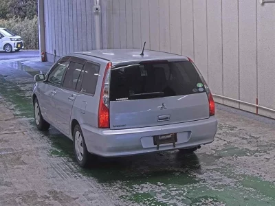 Mitsubishi LANCER  с аукциона в Японии