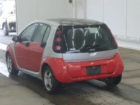 Smart FORFOUR лот № 5048 оценка 3.5  с аукциона в Японии 1