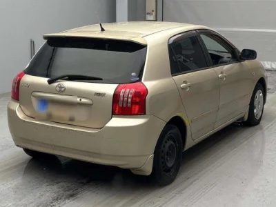 Toyota COROLLA RUNX  с аукциона в Японии