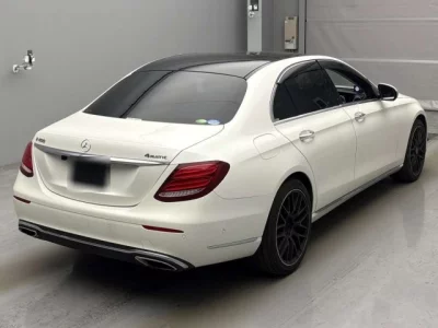 Mercedes-Benz E CLASS  с аукциона в Японии